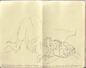 SamPlayingiPhoneOnBed